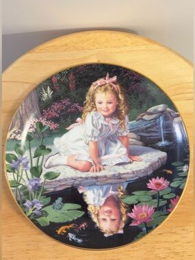 1991 THE DANBURY MINT PORCELAIN PLATE--MONDAY'S CHILD BY ELAINE GIGNILLIAT